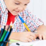 boy using organized homework station