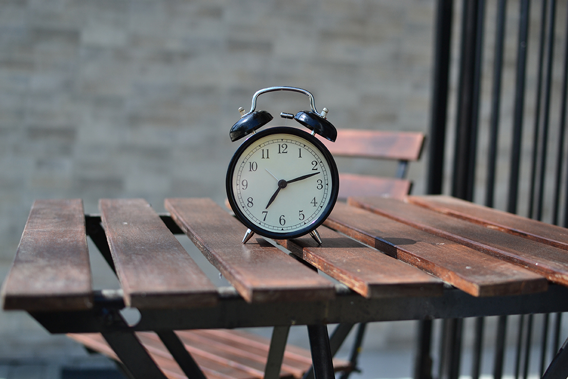 an alarm clock on a table