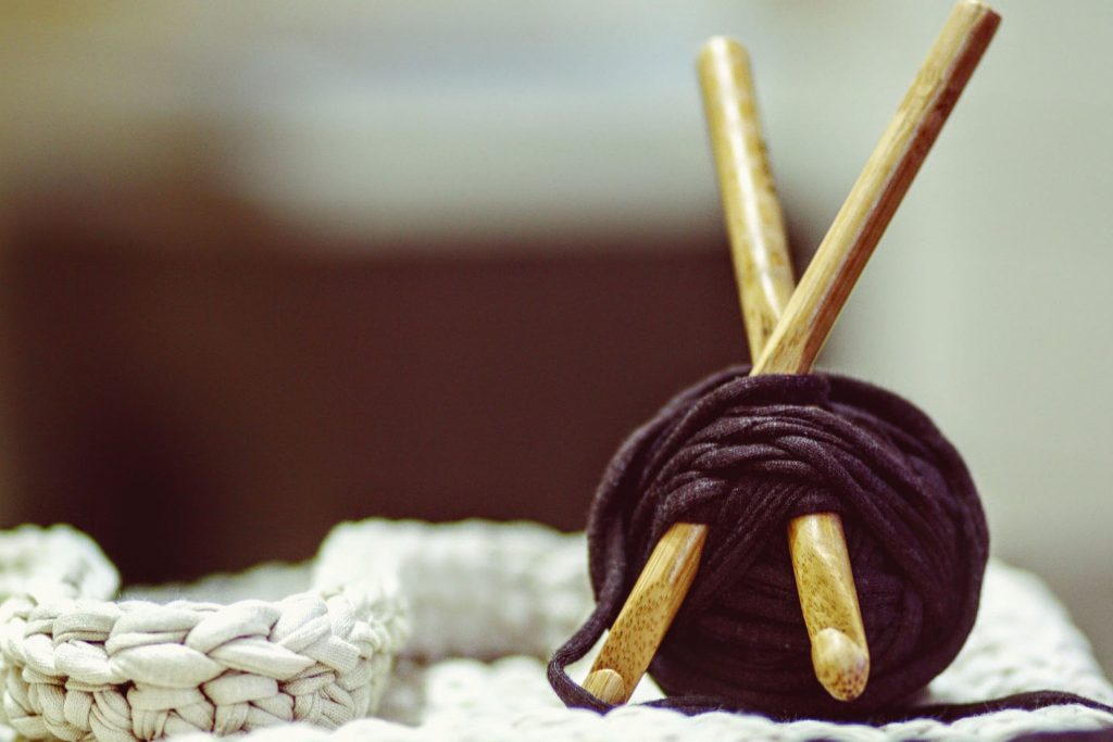 yarn project with knitting needles