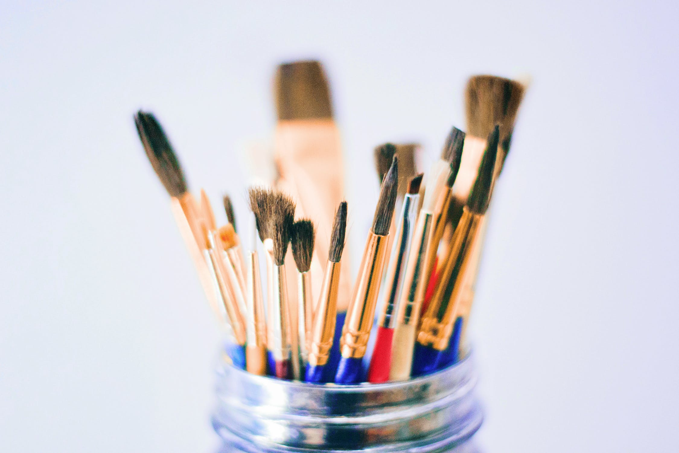 mason jar with brushes