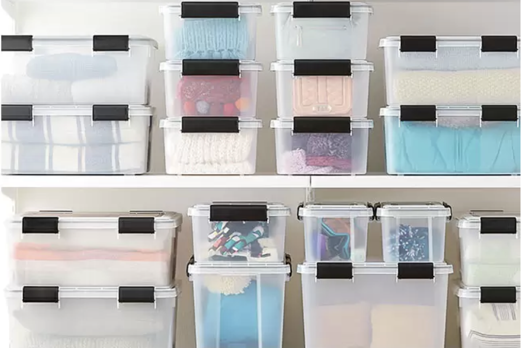 organized bins in closet