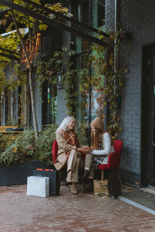 grandmother gifting granddaughter