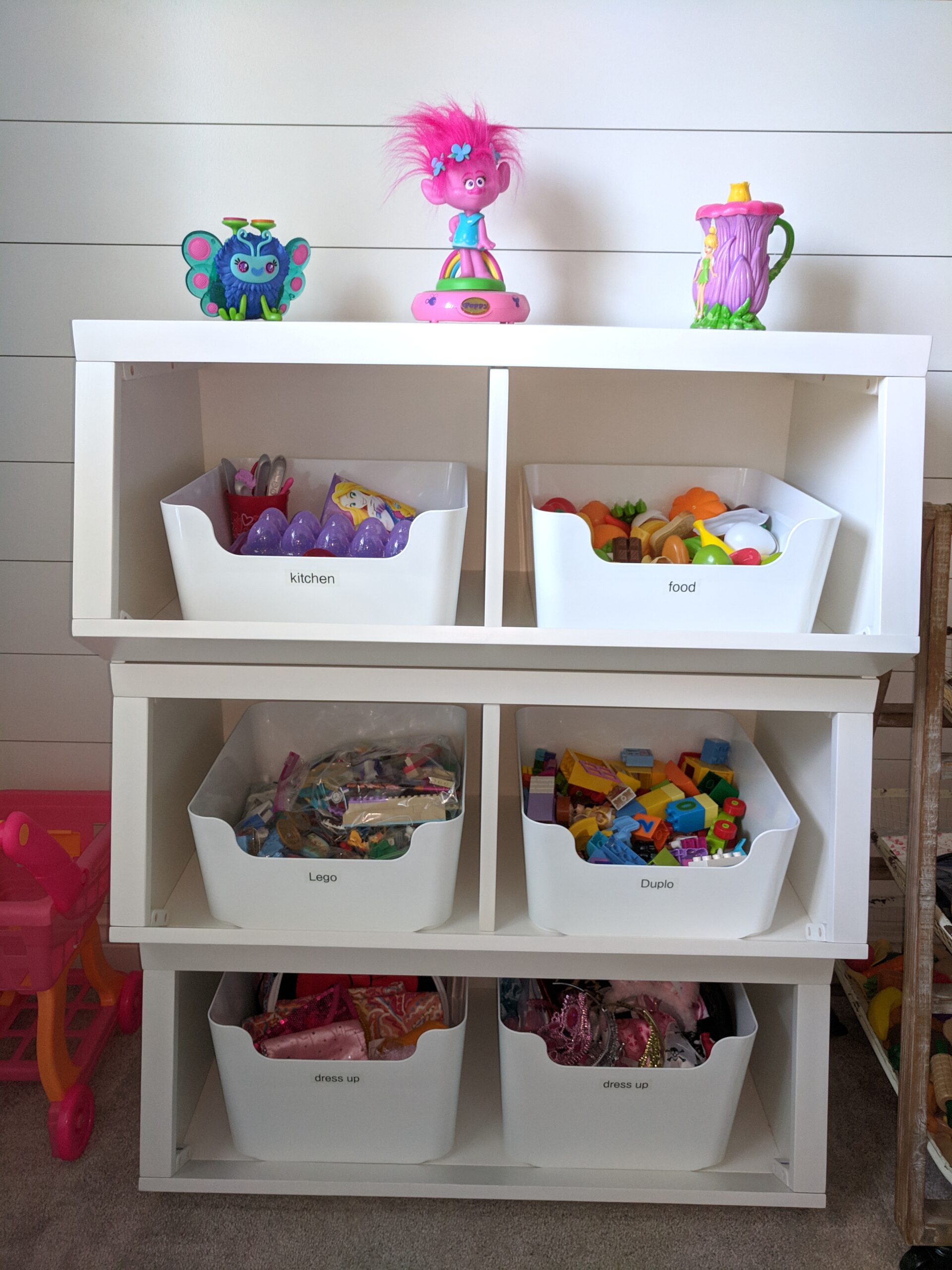 kids playroom organized in bins