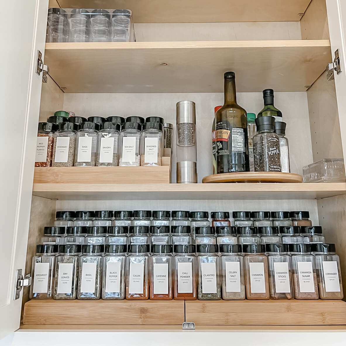 Spices in decanters on shelf in pantry